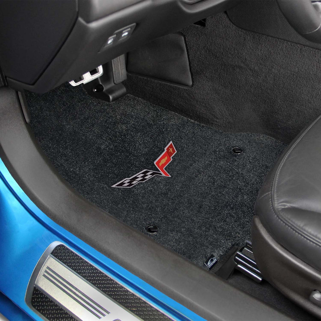 Fits 2007.5-2013 C6 Corvette Driver & Passenger Floor Mats Set; Black / Ebony Velourtex Fabric with Crossed Flags Logo Embroidery